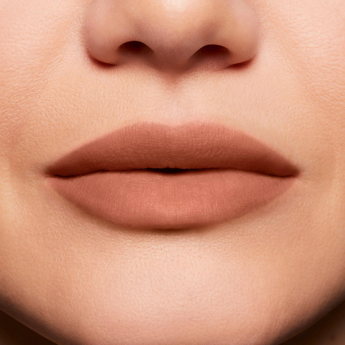 BUXOM worn on lips illustrating visible plumpness and natural color boost