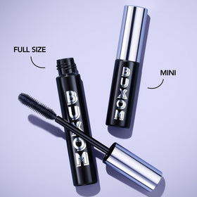 BUXOM mascara being applied to upper lashes demonstrating lift and clump-free result