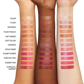 Buxom texture swatch on skin showing hydrating, non-sticky finish benefit
