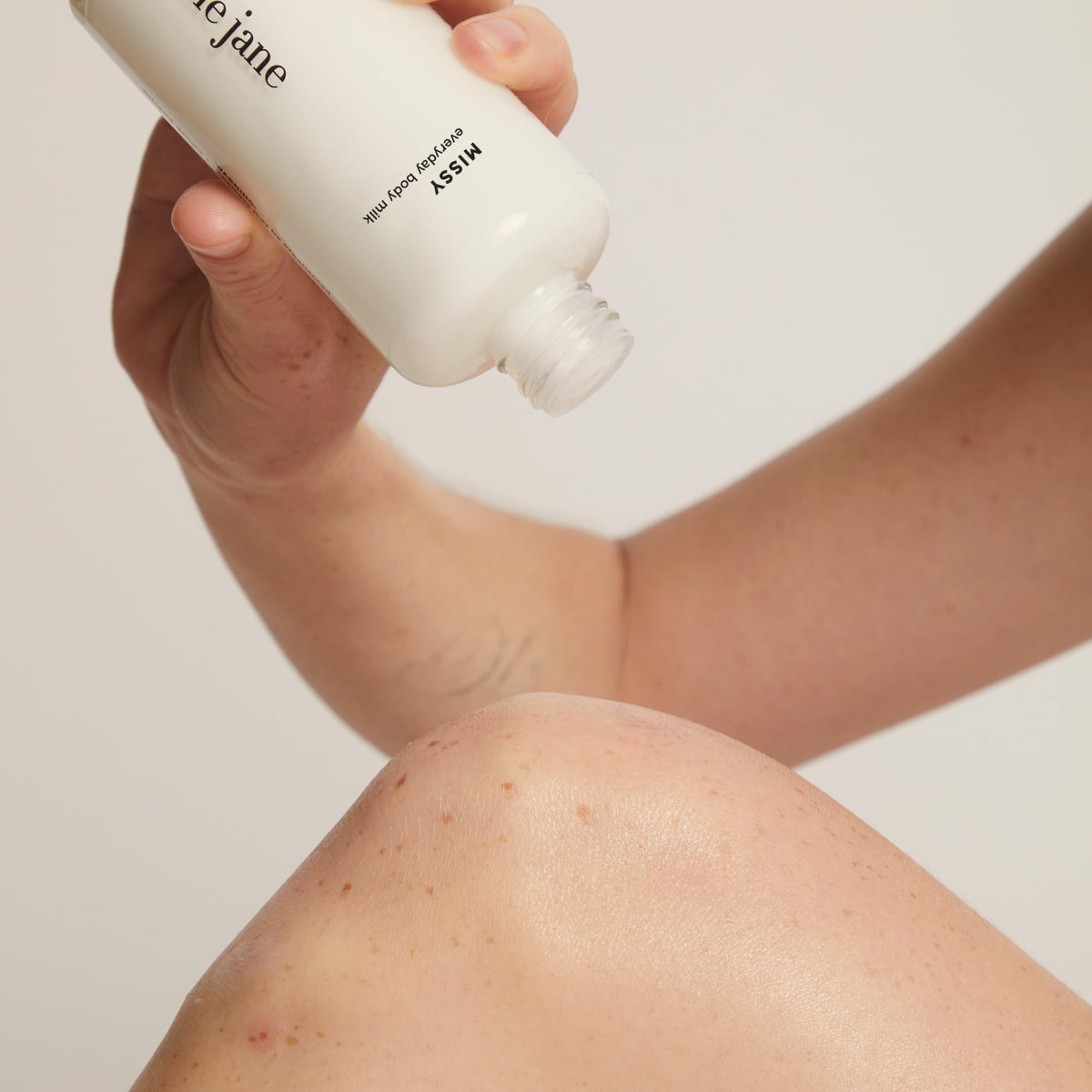 By Rosie Jane pouring milky texture to highlight quick-absorbing hydration