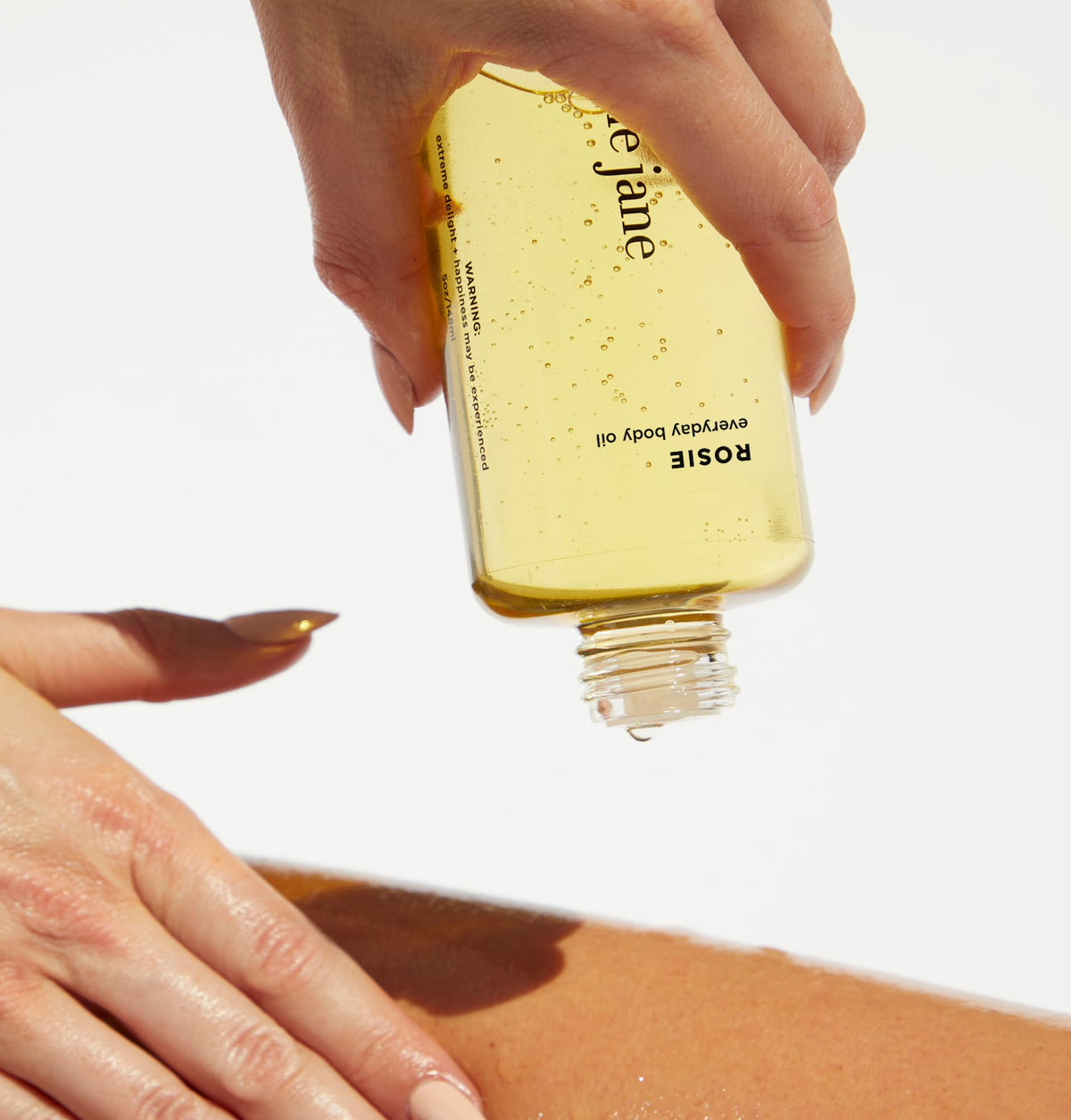 By Rosie Jane pump and cap close-up highlighting easy dispensing benefit