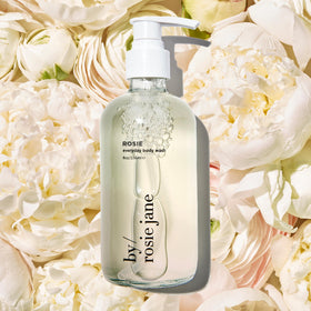 By Rosie Jane bath soak staged with bubbles showing relaxing moisturizing soak