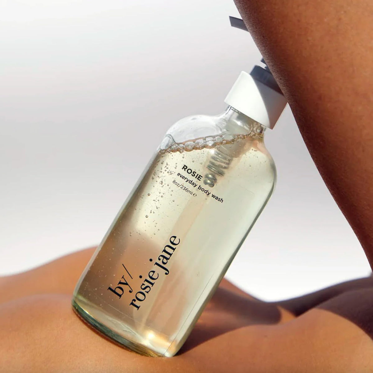 By Rosie Jane label close-up highlighting rose and white musk fragrance