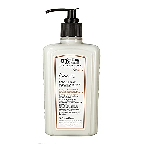 C. O. Bigelow bottle staged on beach prop conveying warm coconut scent
