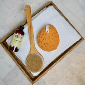 C. O. Bigelow bottle in a shower setting showing everyday use and refreshing scent benefit