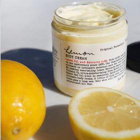 C.O. Bigelow applying cream to feet showing intensive hydration benefit