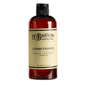 C. O. Bigelow in a bathroom lifestyle setting showing premium home grooming