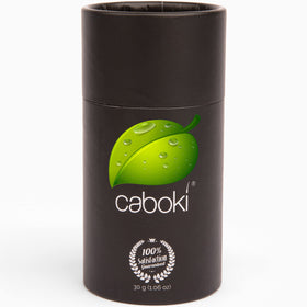 Man and woman outdoors with Caboki showing confident styling