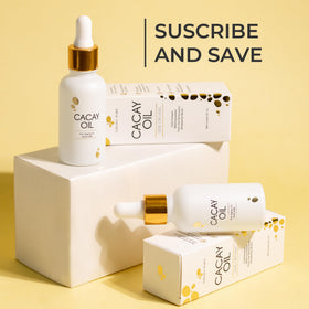 Cacay Pure being applied to cheek showing hydration without greasiness benefit