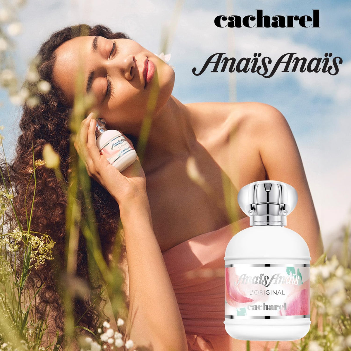 Cacharel Anais Anais 1 fl oz bottle beside a hand for scale and portability