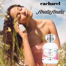 Cacharel Anais Anais 1 fl oz bottle beside a hand for scale and portability
