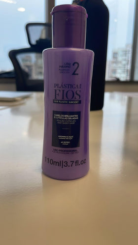 CADIVEU 110ml bottle next to ruler for size and travel-friendly benefit