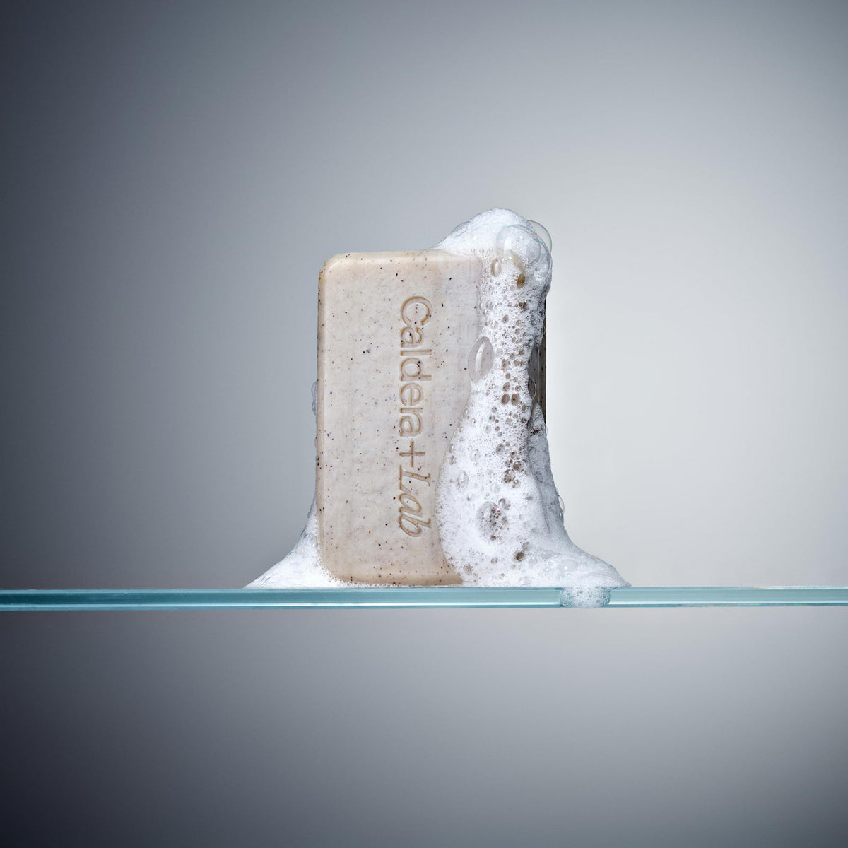 Caldera + Lab bar in shower being used to cleanse and refresh skin