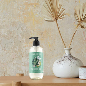Caldrea bottles staged on a bathroom sink adding visual appeal and fragrance