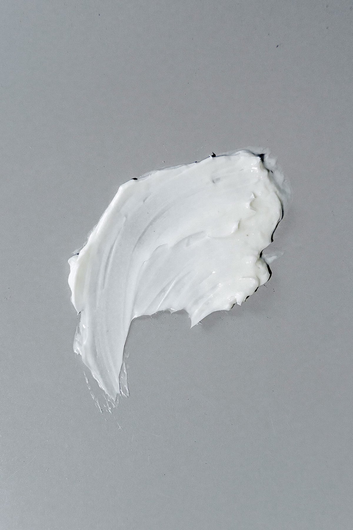 California Born cream being applied to wet hair for instant manageability