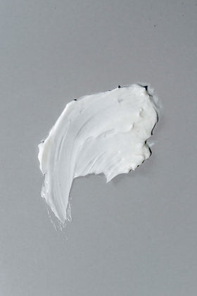 California Born cream being applied to wet hair for instant manageability