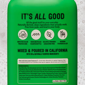 California Naturals bottle held in hand to show 20 fl oz scale and travel readiness