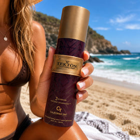 California Tan Optimizer lotion texture on hand demonstrating smooth spread benefit