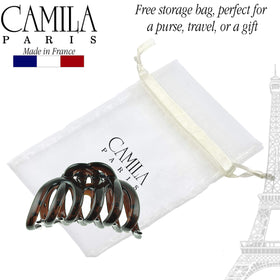 Camila Paris clip next to hand to show 3.5-inch size and capacity