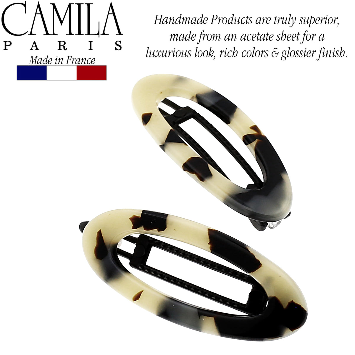 Camila Paris next to hand for scale showing compact portable design