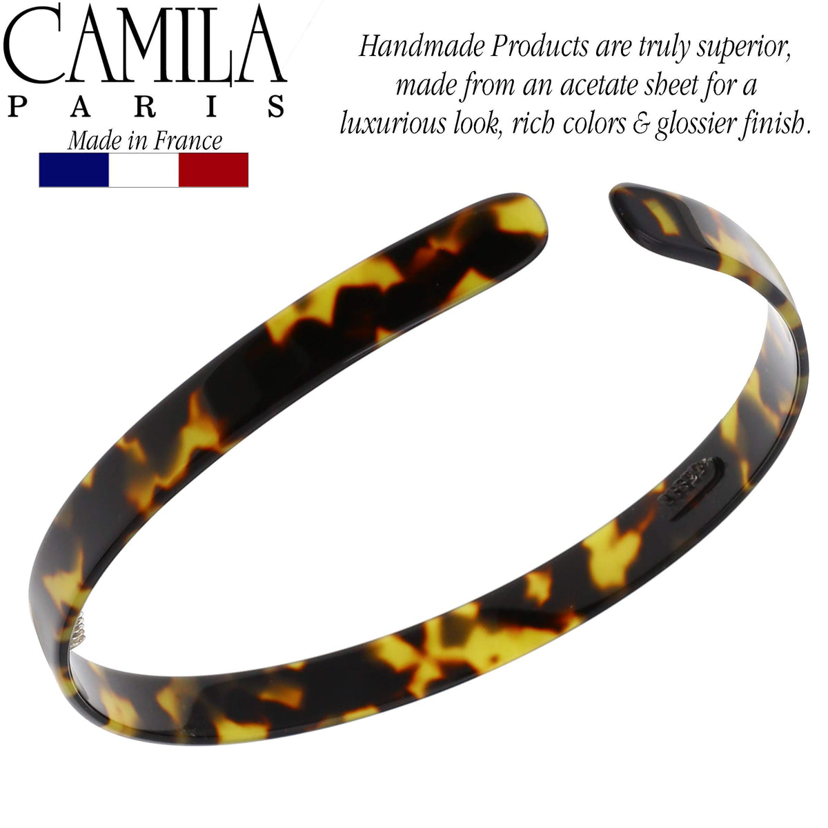 Camila Paris headband on model styling hair for everyday chic and polished look