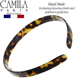 Camila Paris headband in hand showing compact size and lightweight comfort