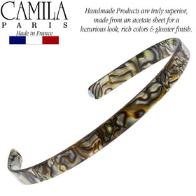 Camila Paris headband held in hand showing lightweight feel and scale