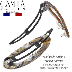 Camila Paris barrettes beside a ruler showing 2-inch size for accurate scale