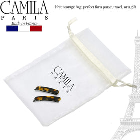 Camila Paris holding thick hair to illustrate strong comfortable grip