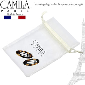 Camila Paris size shown next to a finger for scale and practical fit