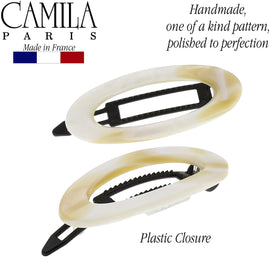Camila Paris size comparison beside ruler showing compact 2-inch practical fit