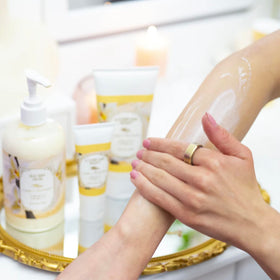 Camille Beckman applying cream to hands demonstrates quick hydration benefit