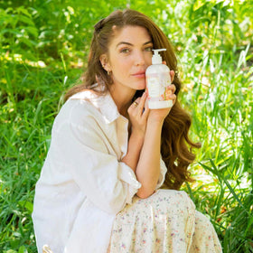 Camille Beckman in bathroom lifestyle scene highlighting daily use and elegant scent