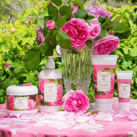 Camille Beckman hand applying cream demonstrating immediate softness and non-greasy benefit