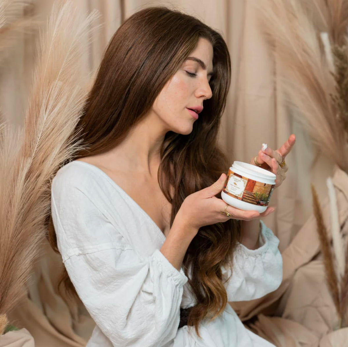Camille Beckman open jar texture close-up showing creamy glycerin-rich formula