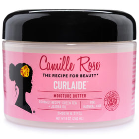 Camille Rose Curlaide jar next to measuring cup showing 8 fl oz scale