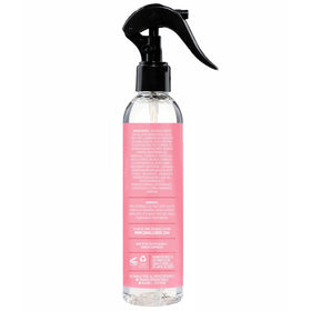 Camille Rose closeup of spray nozzle demonstrating fine mist for even application
