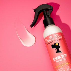 Camille Rose next to a ruler showing 8 fl oz size for clear scale and travel planning