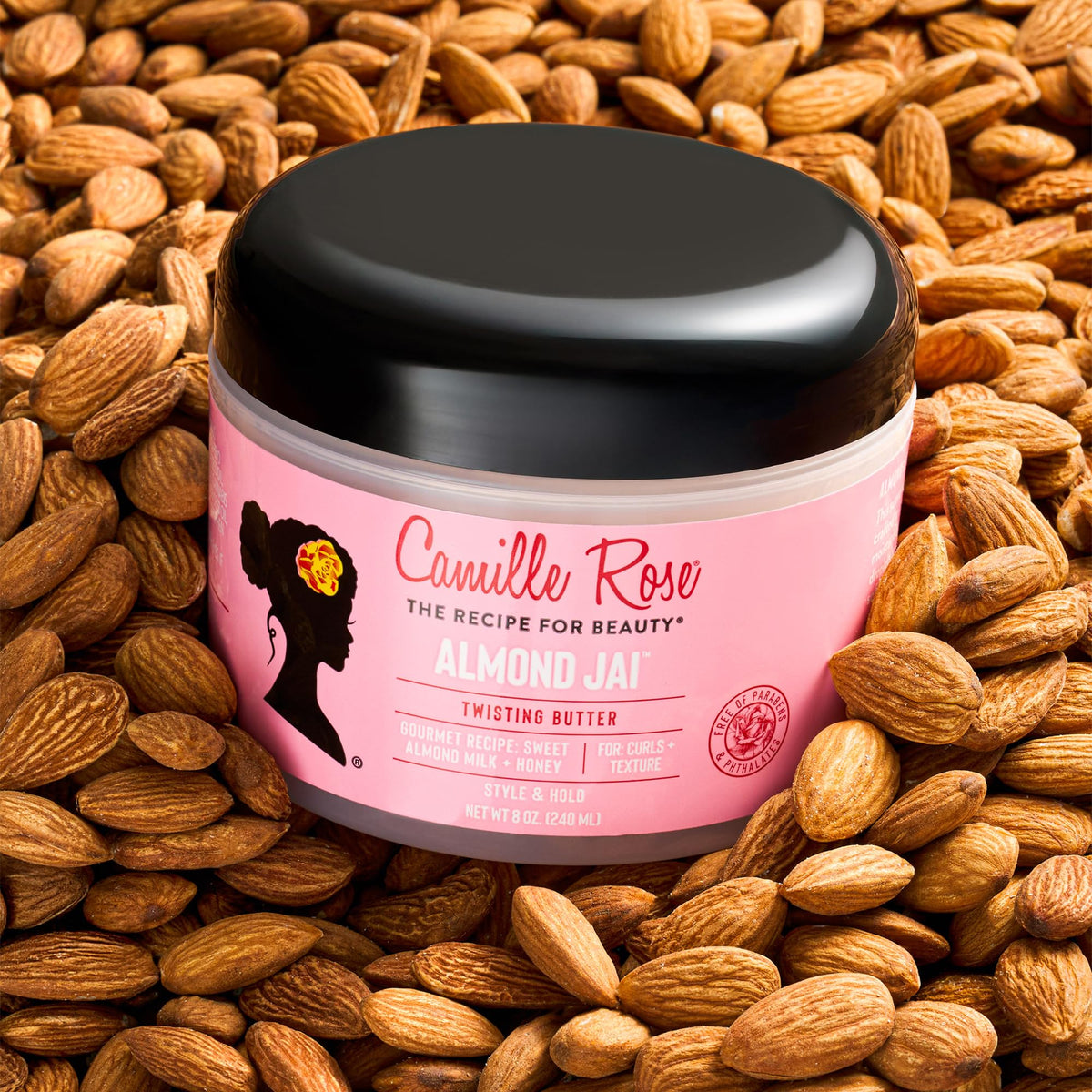 Camille Rose jar in hand for scale demonstrating travel-friendly size