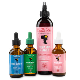 Camille Rose two-pack next to coin for size comparison and portability