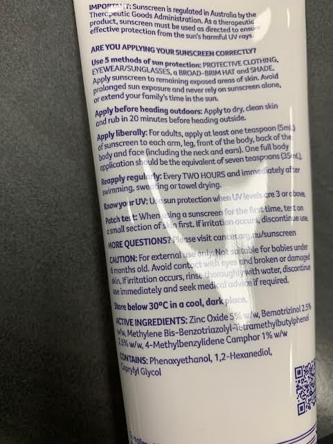 Cancer Council 110 ml tube alongside a travel bag showing portable sun protection