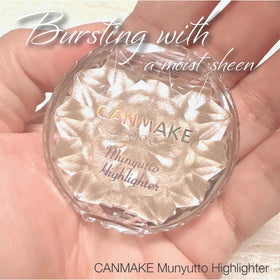 CANMAKE compact held by fingers to show size and travel-friendly benefit