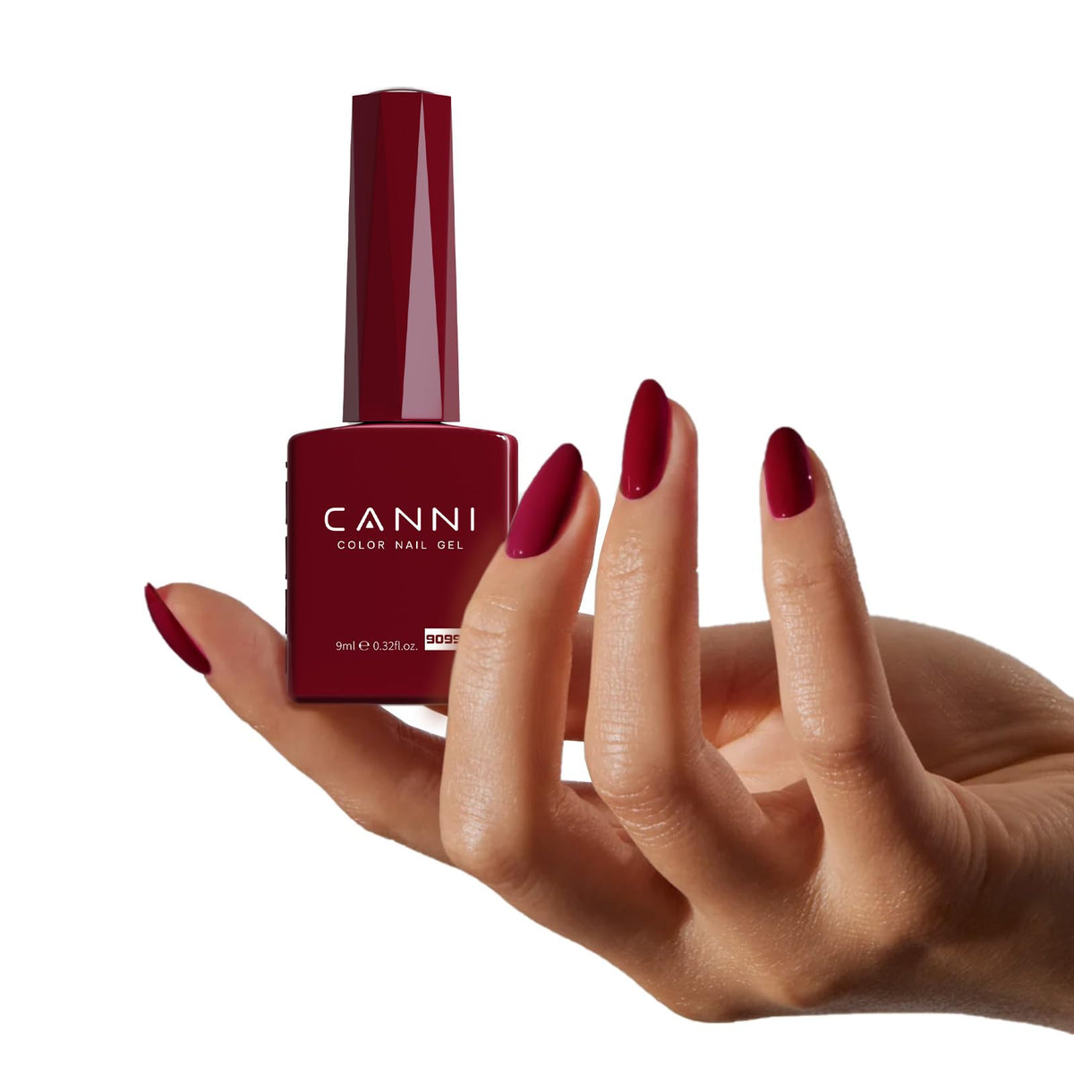 CANNI on a hand model wearing dark cherry burgundy, salon-look finish