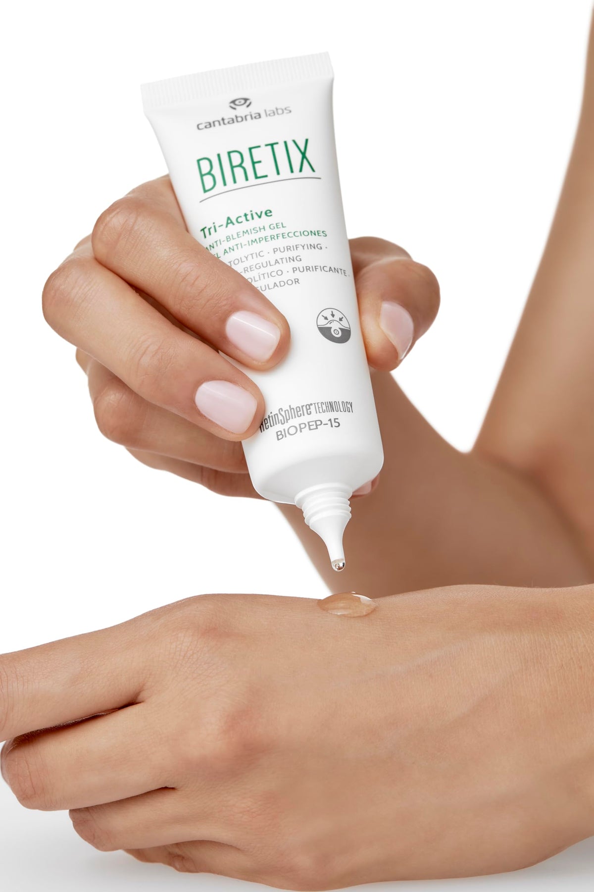 Cantabria Labs Biretix 50ml size comparison next to hand, conveys travel-friendly volume