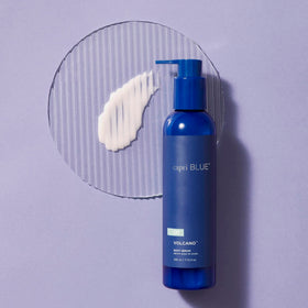 Capri Blue serum pour texture close-up showing lightweight absorbent finish