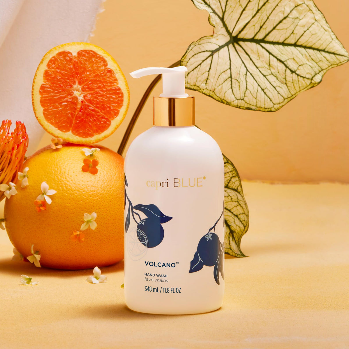 Capri Blue label detail with vibrant Flora Edit artwork, highlights fragrance identity