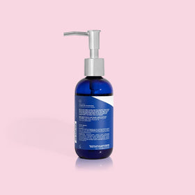 Capri Blue refill packaging with bottle, promoting reduced waste and convenience