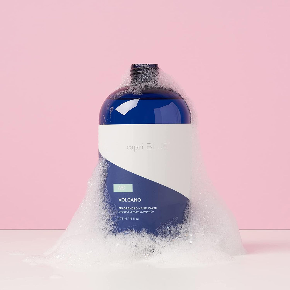 Capri Blue pouring refill close-up demonstrating easy transfer into dispenser