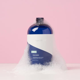 Capri Blue pouring refill close-up demonstrating easy transfer into dispenser