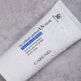 CARE:NEL family using sunscreen outdoors showing gentle protection for all ages